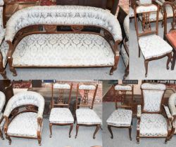 A 19th Century Seven Piece Parlour Suite, comprising: a two seater sofa, a horseshoe backed chair, a