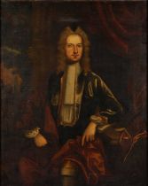 Follower of Sir Godfrey Kneller (1646-1723) Portrait of a gentleman seated at a desk, three-