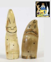 Two Mid-20th Century Alaskan Inuit Carved Tooth Billikens, one in half section, 7.5cm and 9.5cm,