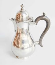 A George V Silver Hot-Water Jug, by Elkington, Birmingham, 1917, in the George I-style, baluster and