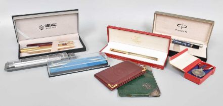 A Collection of Assorted Pens, including a cased Must de Cartier gilt fountain-pen; Parker and other