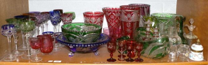 A Large Quantity of Assorted Coloured Glassware, including hock glasses, vases and centre pieces,