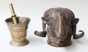 An 18th century Bronze Pestle and Mortar; together with a modern cast bronze sculpture of a rams