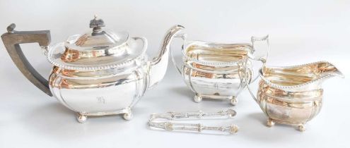 A Three-Piece Edward VII Silver Tea-Service, by Ducrow and Atkins, Birmingham, 1906, in the George
