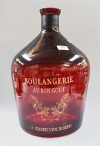 A Large Decorative Ruby Glass Jar, inscribed in gilt lettering 'Boulangerie, Au Bon Gout, Le Queenie