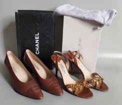 Pair of Chanel Tan Leather Chanel Court Shoes, with stitched crossed c's to the toes, 6cm heel,