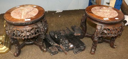 A Pair of Chinese Marble Topped Hardwood Stands, each on scroll supports with X frame cross