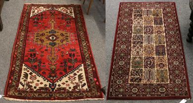 Hamadan Rug, the raspberry field with central medallion enclosed by spandrels and narrow borders,