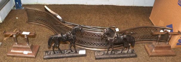 A George III Pierced Steel Bedroom Fire Fender, of serpentine form, a pair of similar andirons,