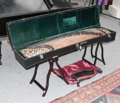 A Modern Chinese Guzheng, (zither) of recent date, with fitted carry case and playing stand, and