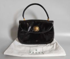 Circa 1980s Gucci Black Patent Handbag, with gilt-tone hardware, unusual decorative enamel tigers