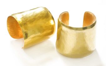 A Pair of Silver Gilt Cuffs, by Dower & Hall, of broad yellow planished form They are hallmarked