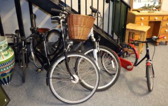 A Raleigh Voyager Mountain Bike, and a Pashley childs trike; together with a further childs