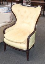 A Button Back Wing Chair, with carved and reeded mahogany frame