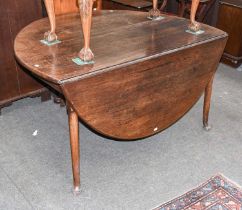 An 18th century Oak Gateleg Table, 151cm by 136cm by 73cm