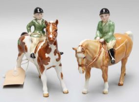 Beswick Girl on Pony, model No. 1499, skewbald gloss and Boy on Pony, model No.1500, palomino