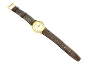 A Gents Gold Tissot Wristwatch, the case stamped 18k and with import marks with date aperture