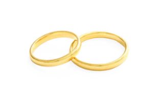 Two 22 Carat Gold Band Rings, finger sizes L1/2 and S1/2 Gross weight 7.1 grams.
