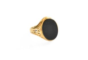 A 9 Carat Gold Hardstone Signet Ring, finger size Q The ring is in good condition with slight