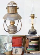 A Brass Hanging Oil Lamp, an oil lamp with clear glass reservoir, a small quantity of postcards,