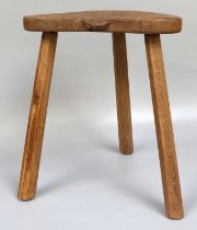 Workshop of Robert Mouseman Thompson (Kilburn): An English Oak Cow Stool, the kidney shaped seat