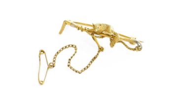 A Fox and Crop Brooch, stamped '18C', length 4.1cm The brooch is in good condition. It fastens