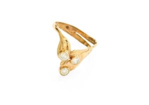 A 9 Carat Gold Diamond Three Stone Ring, of yellow plain polished floral form, each terminating to a