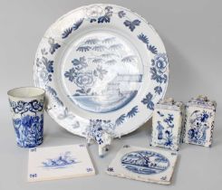 A 18th Century and Later Delft, including two chinoiserie jars Delft plate - 36cm diameter and