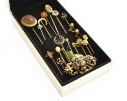 A Quantity of Jewellery, comprising of seventeen stick pins, of varying designs including a lava