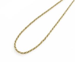 A Bi-Colour Rope Twist Necklace, clasp stamped '750', length 68.8cm Gross weight 45.9 grams.