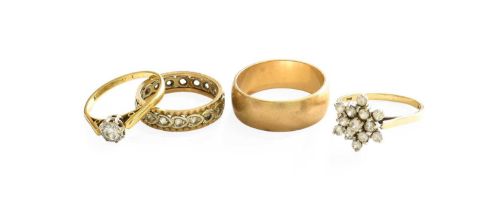 An 18 Carat Gold Diamond Solitaire Ring, the round brilliant cut diamond in a white illusion