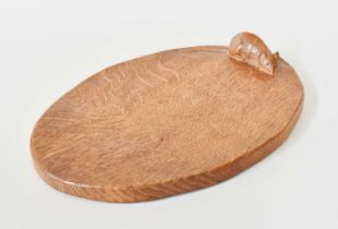 Robert Mouseman Thompson (1876-1955): An English Oak Cheese Board, of standard form, with carved