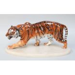 A Royal Doulton Porcelain Model of a Stalking Tiger, HN2646, on later onyx plinth, 35cm