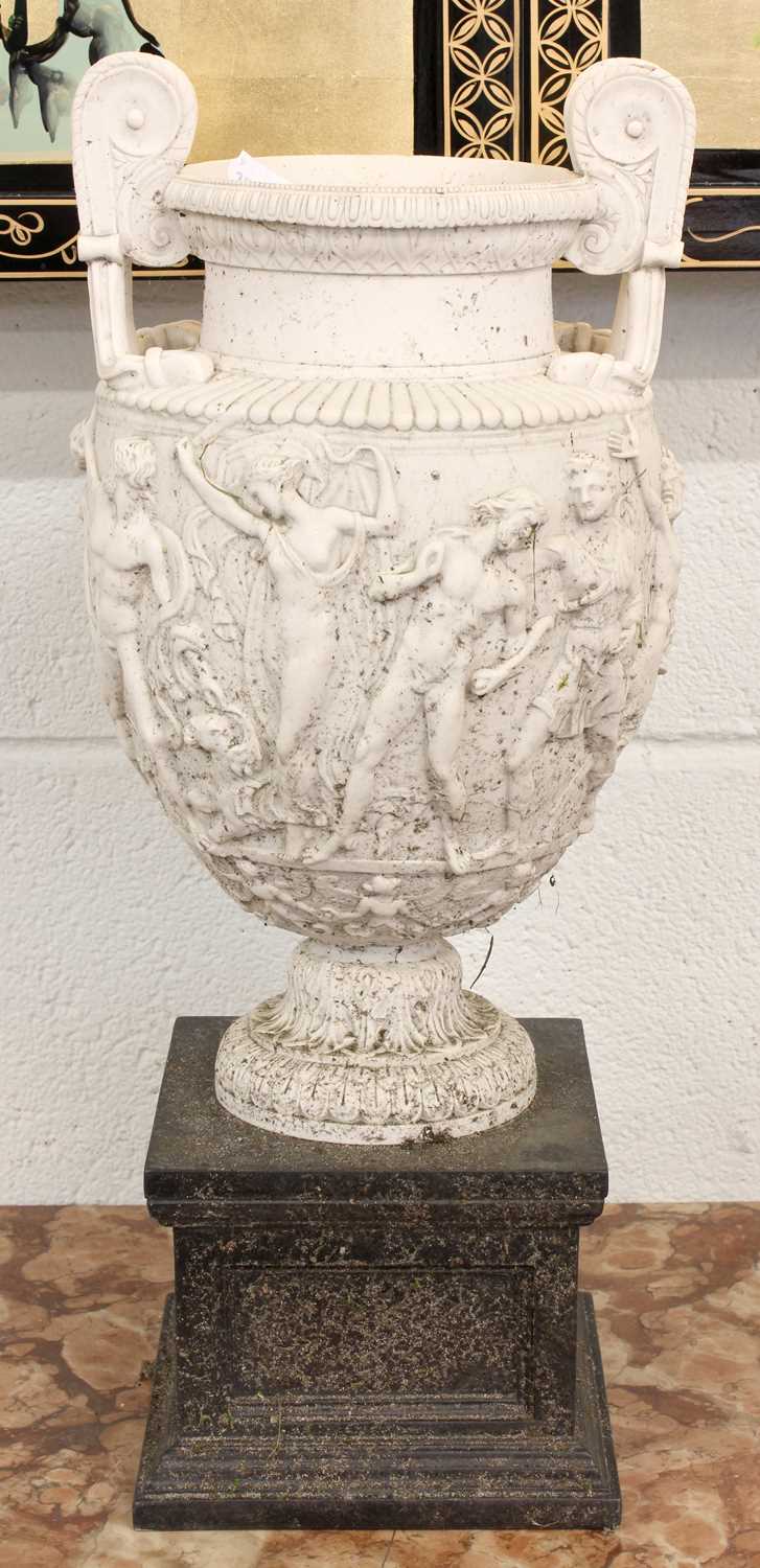 After the Antique a Pair of Composite Urns, modelled after the Townley Vase, raised on square - Image 2 of 3