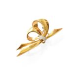 A Diamond Bow Brooch, the yellow plain polished bow motif gathered centrally with round brilliant