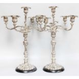 A Pair of Silver Plate Five-Light Candleabra, each on leaf-cast base, the baluster stem similarly