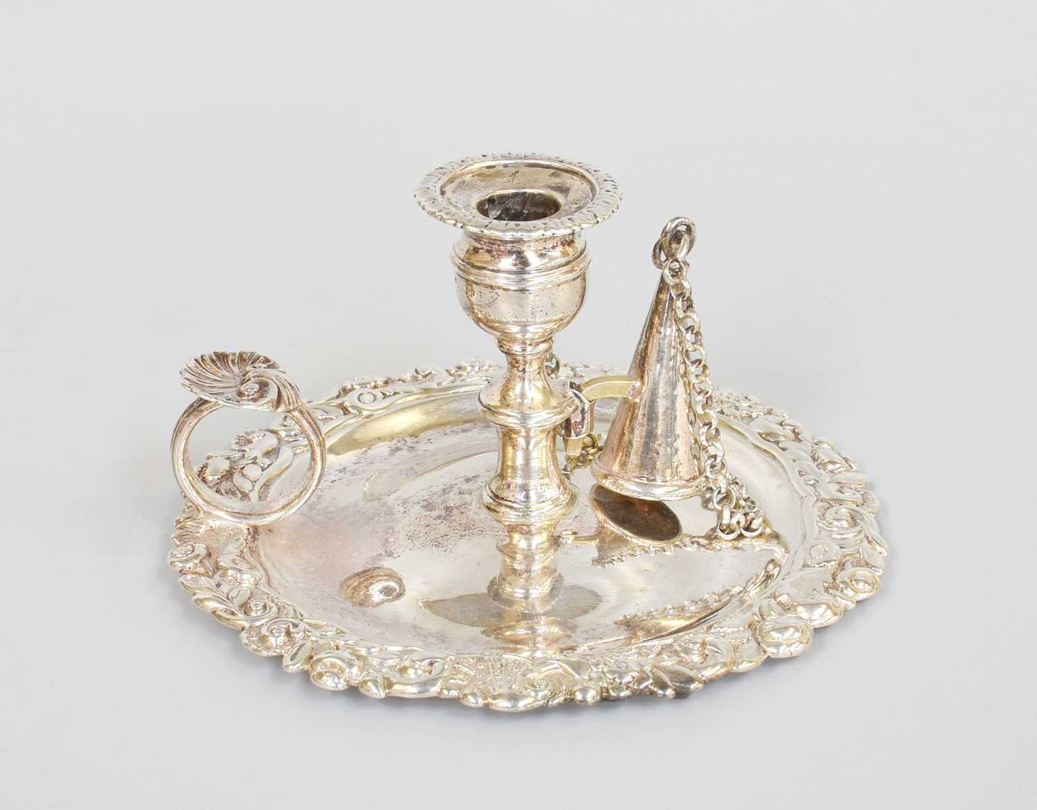 A George IV Silver Chamber-Candlestick, by Rebecca Emes and Edward Barnard, London, 1821, shaped