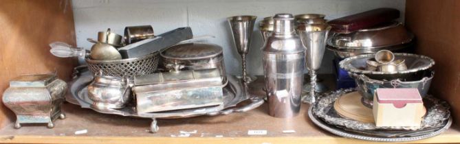 A Collection of Assorted Silver Plate, including a tray; entrée-dishes and other items (one shelf)