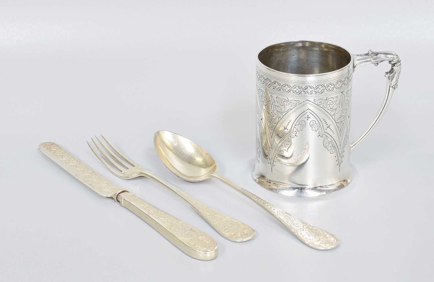 A Four-Piece Victorian Silver Christening-Set, The Mug by Walker and Hall, Sheffield, 1897, The