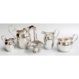 A Graduated Set of Three Cream-Jugs With a Sugar-Bowl and a Small Basket En Suite, by T. H.