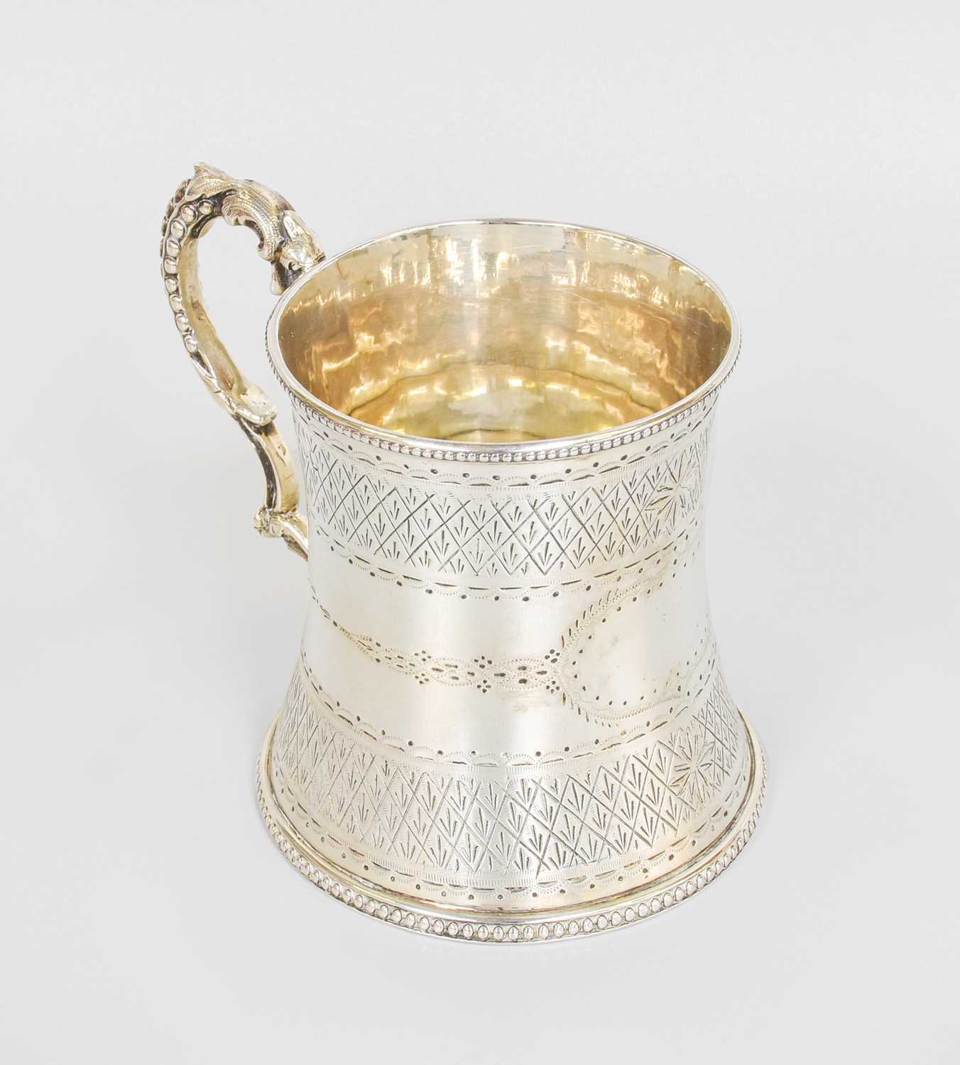 A Victorian Silver Christening-Mug, by Thomas Smily, London, 1866, centrally waisted and with beaded