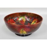 A William Moorcroft Flambé "Leaves and Fruit" Pattern Bowl, produced between 1928-1934, impressed