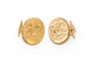 A Pair of Cufflinks, the oval panels with coat of arms decoration, within a rope work border,
