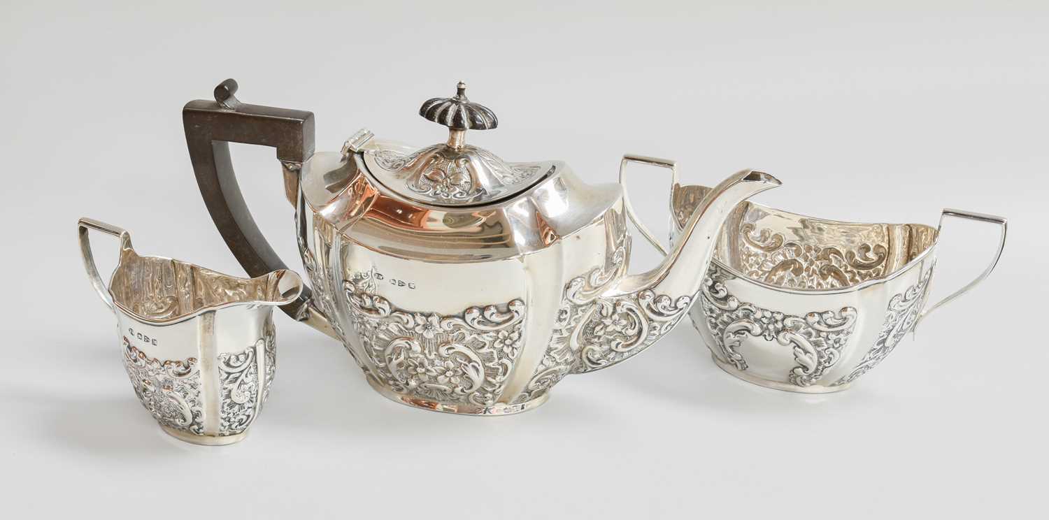 A Three-Piece Victorian Silver Tea-Service, by Florence Warden, Chester, 1895, each piece tapering