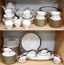 A Bavarian Porcelain Part Dinner Service, with cobalt blue and gilt borders, including various