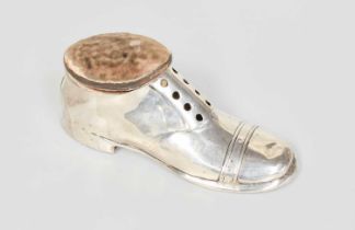 A George V Novelty Silver Pin-Cushion, Maker's Mark Worn, Chester, 1910, in the form of a boot, 13cm