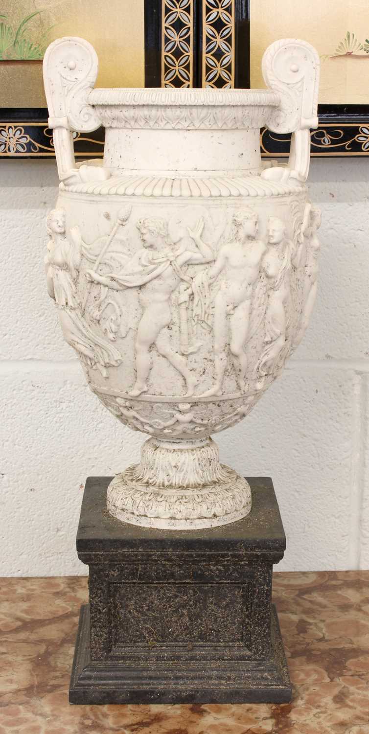 After the Antique a Pair of Composite Urns, modelled after the Townley Vase, raised on square - Image 3 of 3