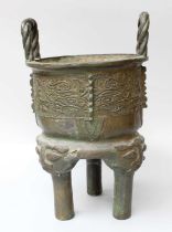 A Chinese Bronze Tripod Censer, in archaic style, with ropetwist handles, 39cm high Large solder