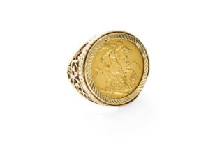 A Sovereign Ring, dated 1915, loose mounted, finger size R Loose mount unmarked, in our opinion