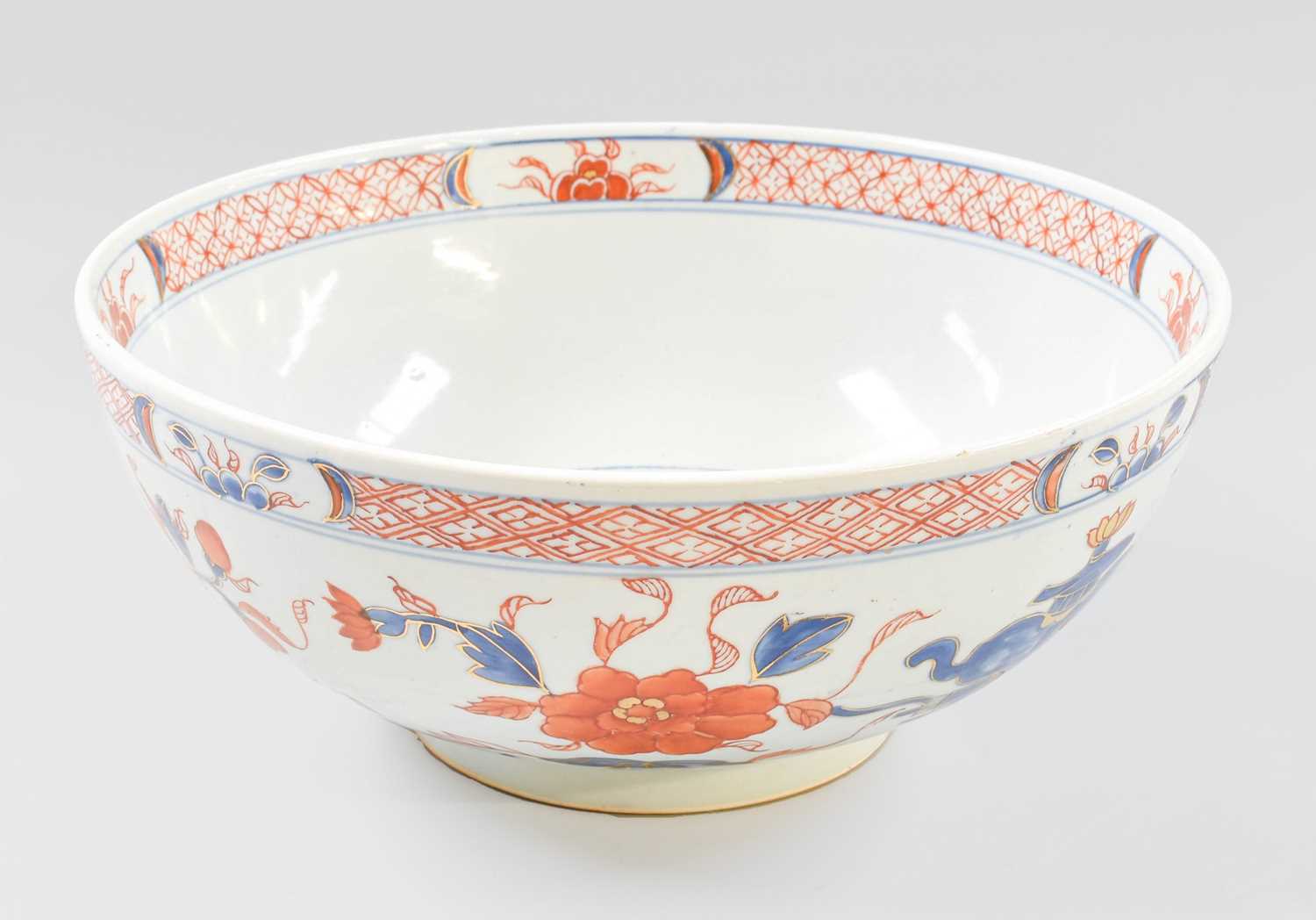 A Chinese Porcelain Bowl, Qianlong style, painted in the Imari palette with scholar's objects and